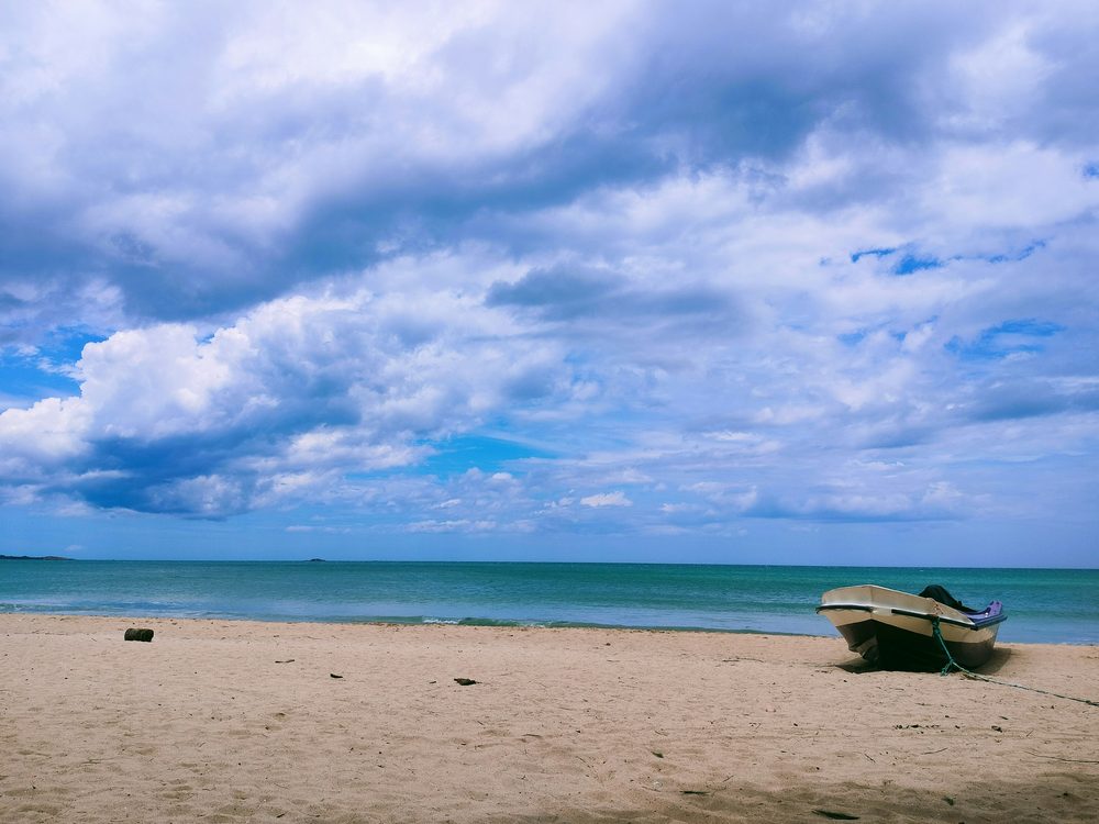 Nilaveli, Sri Lanka — Powder-white sand on the calm eastern shore. Private driver and tours.