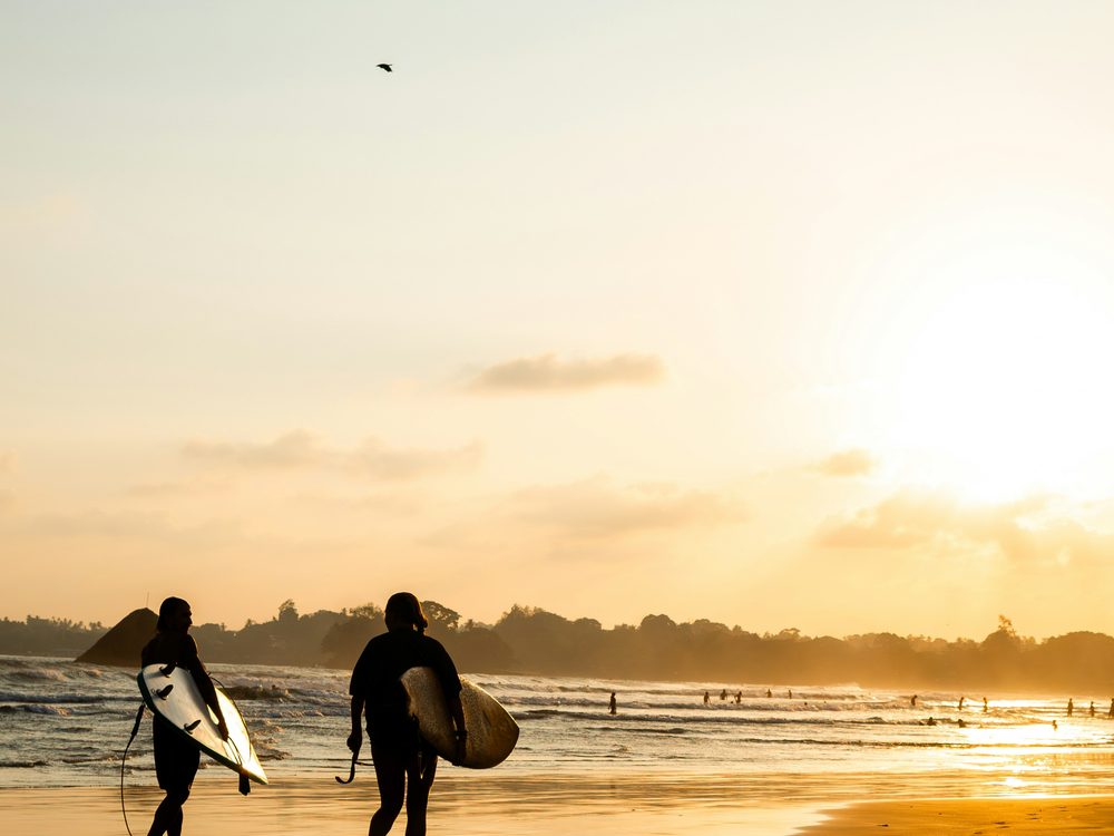 Weligama, Sri Lanka — Gentle waves and a classic beginner surf beach. Private driver and tours.
